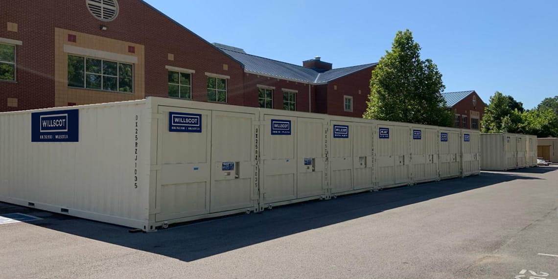 Portable storage containers lined up in a row