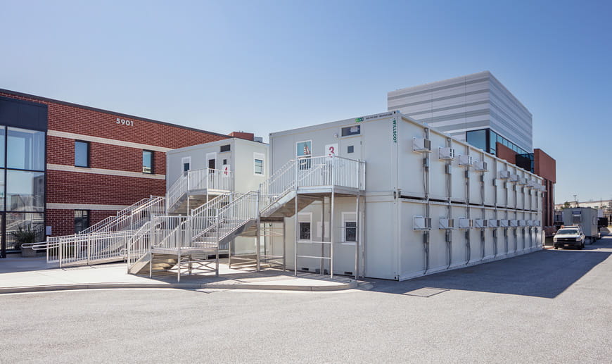 Two story temporary buildings used for social distancing workspace during Covid-19 vaccine development