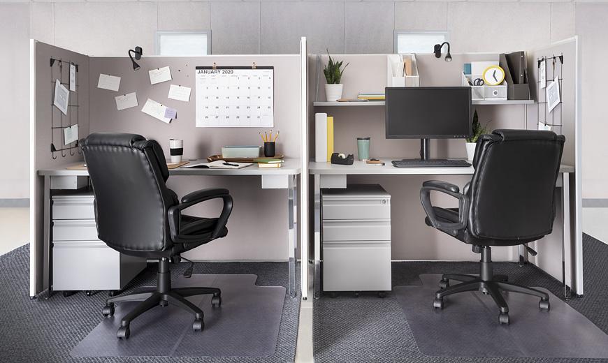 Furnished Basic level cubicles containing office supplies